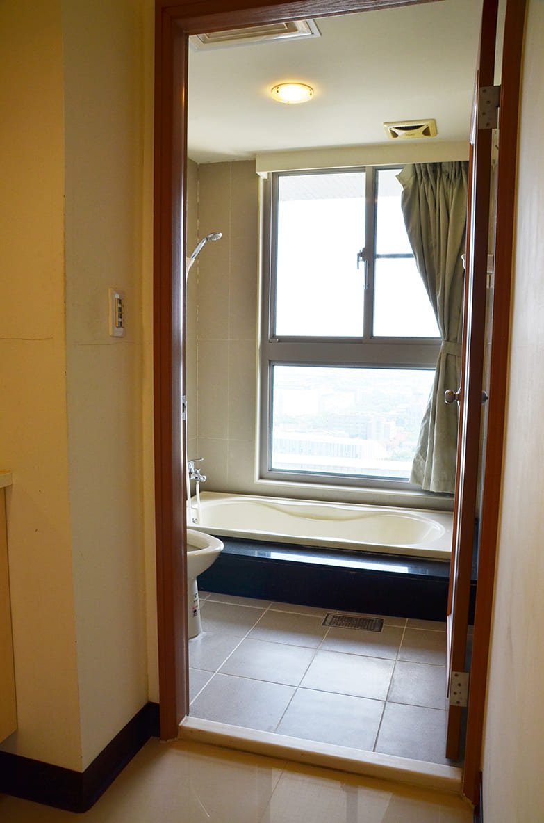 Taichung Dormitory Single Type B bathroom and door picture.